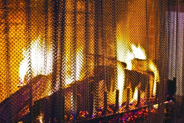 The glowing fireplace in the Memorial Union provides a cozy place for students congregate. (Photo by Marissa Krings)