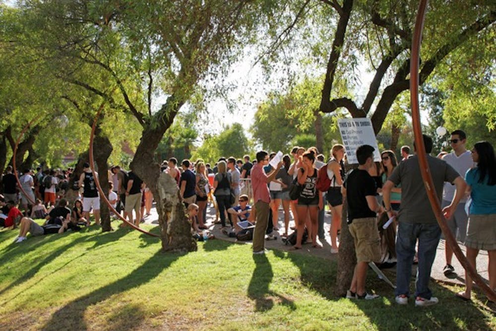 THE WAIT: Hundreds of students wait outside Gammage Thursday afternoon to trade in vouchers for their tickets to Tosh.0. Some students near the front of the line waited for nearly 4 1/2 hours to get their voucher tickets. (Photo by Rosie Gochnour)