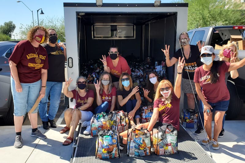 ASU Moms celebrate completing 300 care packages in Phoenix on Saturday, Oct. 10, 2020.