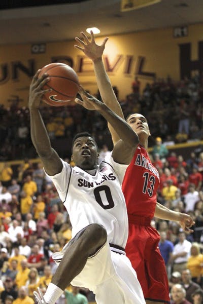 Senior wing Chris Colvin (2) recorded nine points and six rebounds during the Sun Devils’ scrimmage on Saturday, including a monster duck over freshman forward Kenny Martin. (Photo by Sam Rosenbaum)