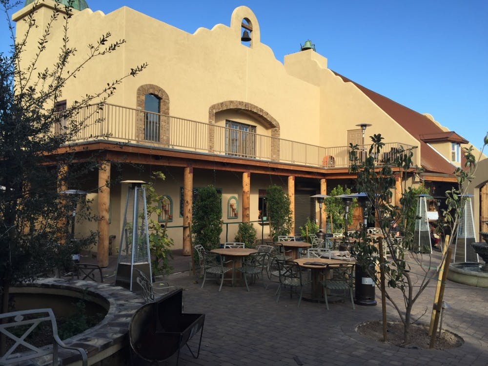 A beautiful courtyard styled as a Mexican mission welcomes guests into Minder Binder. The restaurant reopened on Oct. 16, 2014, after a successful two-year rehabilitation. (Nicholas Latona/The State Press)