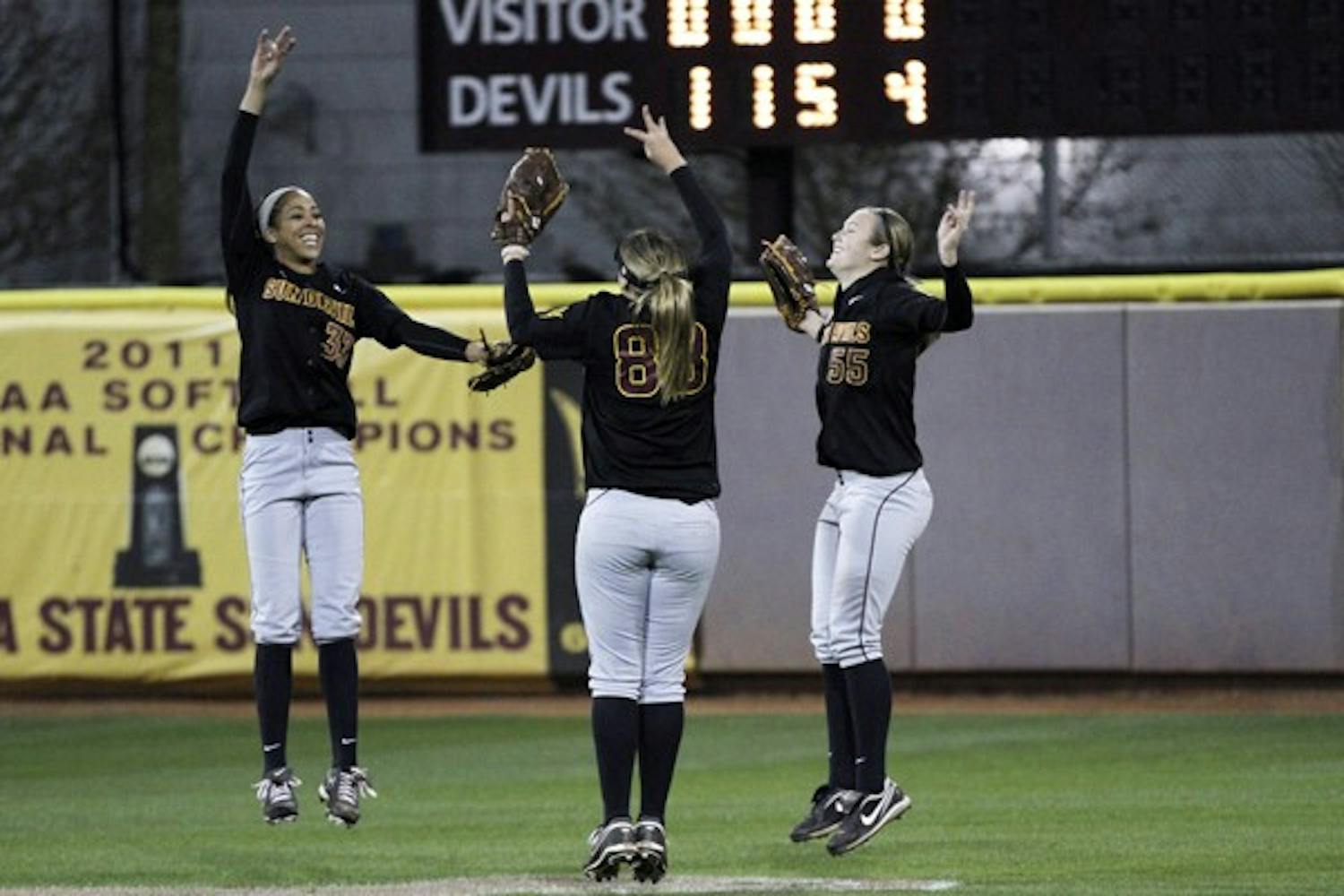 (Left to right) Alix Johnson, Annie Lockwood and Elizabeth Caporuscio celebrate during a game against Wichita State on March 1. Caporuscio, a freshman, leads the Sun Devils’ offensive attack and is making strides in her leadership. (Photo by Sam Rosenbaum)