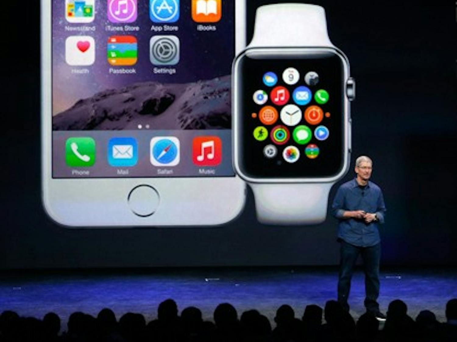 Apple CEO Tim Cook introduces the iPhone 6 and the Apple smartwatch at the Flint Center on Tuesday, Sept. 9, 2014, in Cupertino, Calif. (Karl Mondon/Bay Area News Group/MCT) 