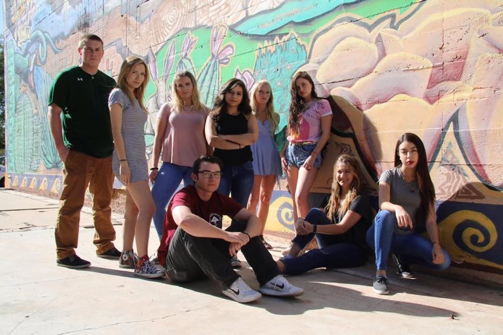 The nine&nbsp;criminology and criminal justice freshmen&nbsp;curating the "Inkarcerated: Creativity Within Confinement" show pose for a photo. They&nbsp;have been preparing for their project since the fall 2016 semester.