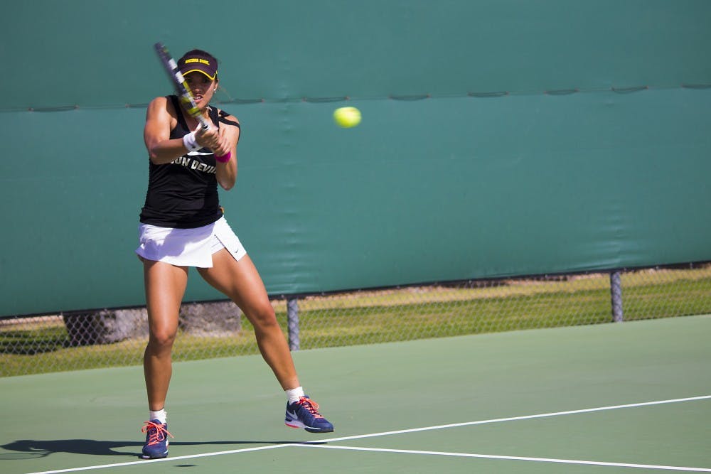 ASU junior Desirae Krawczyk returns during the doubles clash with BYU’s pair of Mayci Jones and Toby Miclat on Feb. 14, 2015, at the Whiteman Tennis Center in Tempe. The match ended with the final score of ASU 7 BYU 6. (Shiva Balasubramanian/The State Press)