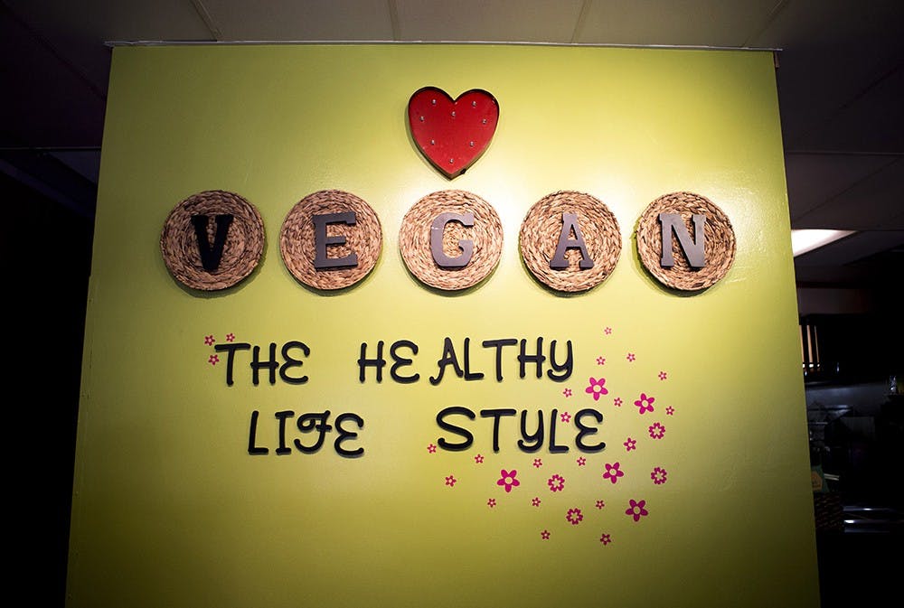A healthy living sign greets customers as they enter the Vegan House on Adams and Central Street in downtown Phoenix on Tuesday, Sept. 15, 2015.