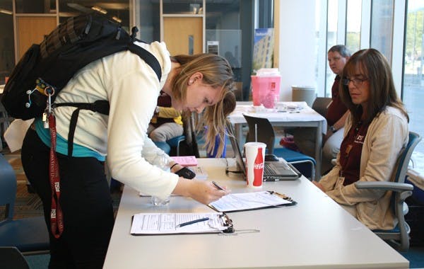 Katrece Swenson, a sophomore studying biological science attended the ASU Health Services Flu Clinic to get her shot for the season. As a peer mentor living in the dorms, she wants avoid if at all possible getting sick this flu season. (Photo by Hector Salas Almeida)