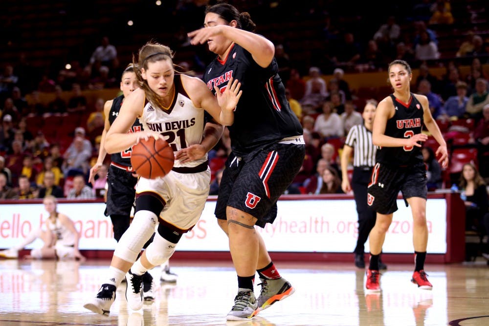 Junior forward Sophie Brunner (21) works against Utah defense on Sunday, Jan. 17, 2015, during the Arizona State women's basketball game against the University of Utah in Wells Fargo Arena in Tempe.