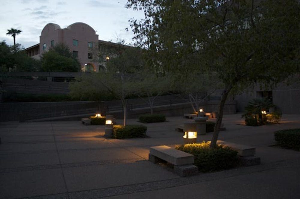 CALM NIGHT: As the sun sets, the ground is lit up at an outdoor retreat area outside the main Tempe Police station Wednesday night. (Photo by Taylor Lineberger)