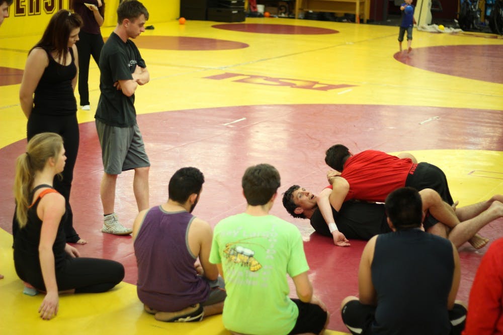Instructor of ASU's American Pankration club gives demonstration