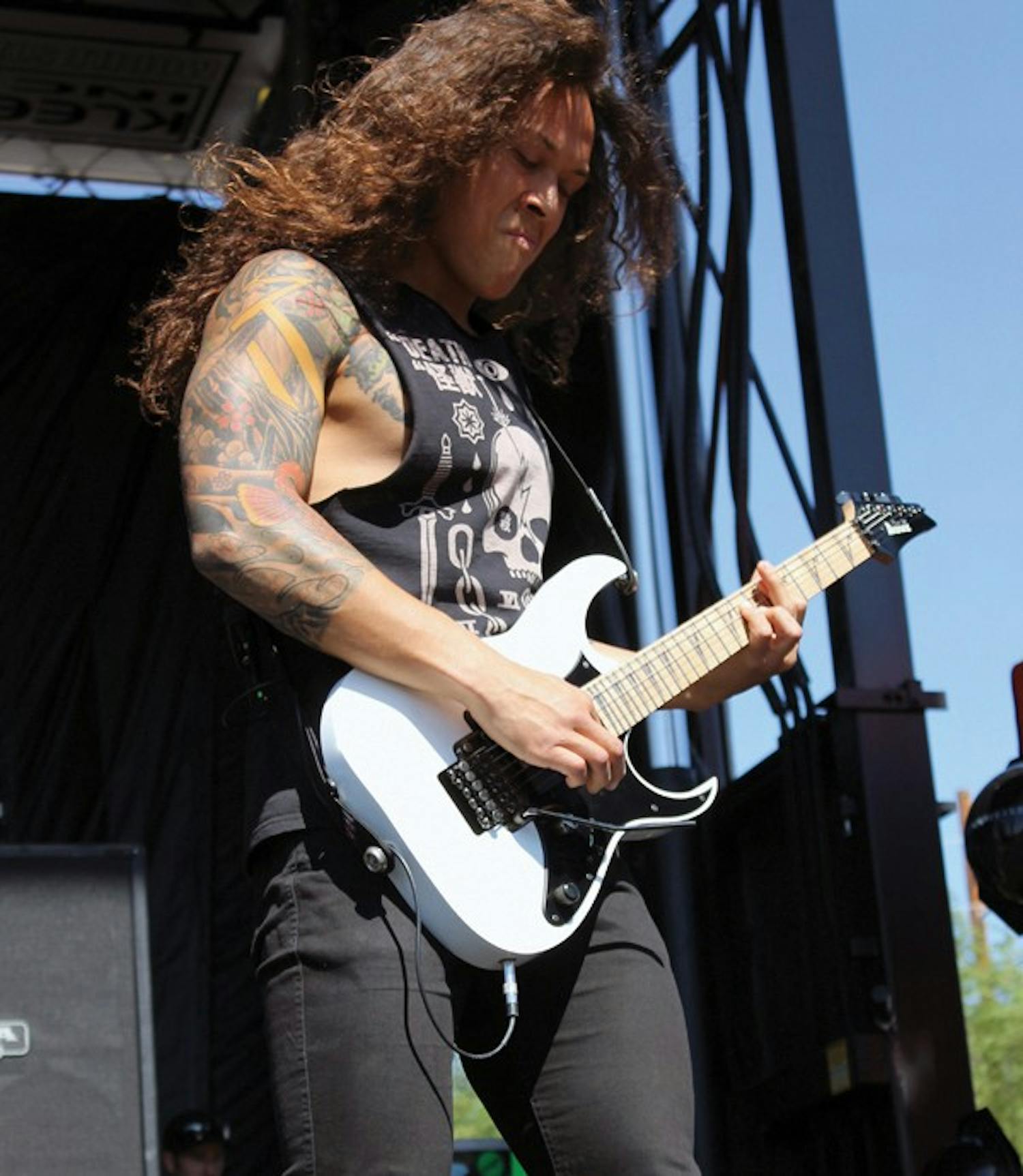 Nick Hippa of As I Lay Dying  strums metalcore guitar riffs at the Rockstar Energy Mayhem Festival on July 6. (Photo by Michelle Tabatabai-Shahab)