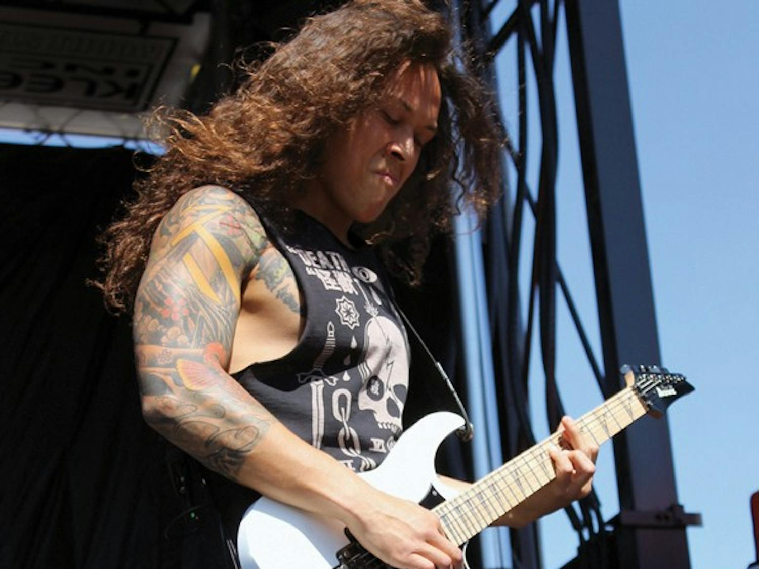 Nick Hippa of As I Lay Dying strums metalcore guitar riffs at the Rockstar Energy Mayhem Festival on July 6. (Photo by Michelle Tabatabai-Shahab)