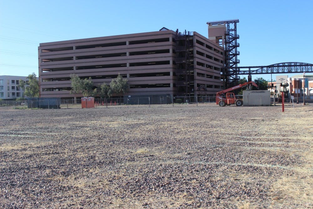 A dirt lot on the northeast corner of University Drive and Farmer is pictured on Sunday, April 17, 2016, where a new apartment complex had been proposed to be built.