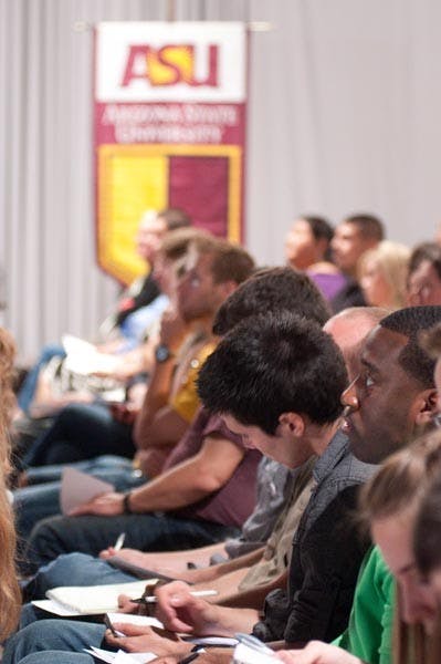 A CALL FOR TEACHERS: ASU students gathered in the Cronkite building Monday morning to hear U.S. Secretary of Education Arne Duncan address college students around the nation in a live broadcast urging them to pursue teaching professions. (Photo by Aaron Lavinsky)