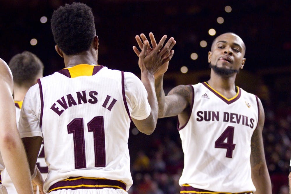 ASU junior guard Shannon Evans II (11) high-fives senior guard Torian Graham (4) after a big play in the first half of a men's basketball game against the UNLV Runnin' Rebels in Wells Fargo Arena in Tempe, Arizona on Saturday, Dec. 3, 2016. ASU won 97-73, putting them at 5-3 on the season.