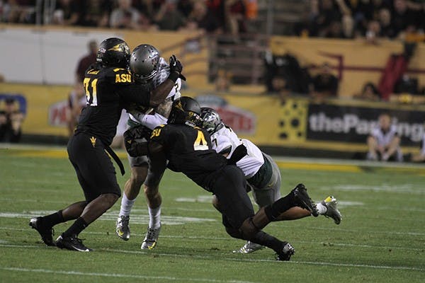 This weekend, CU looks to improve their running game against the Sun Devils. Presently, their running game has been less than satisfactory for coach Mike MacIntyre. (Photo by State Press Staff)