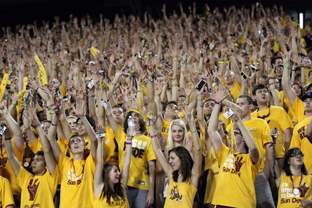 GAME DAY: Students in the students section cheer on ASU against Oregon State last Saturday. Attendance numbers show that the new Game Day initiative is working as more students are attending games. (Photo by Lisa Bartoli)