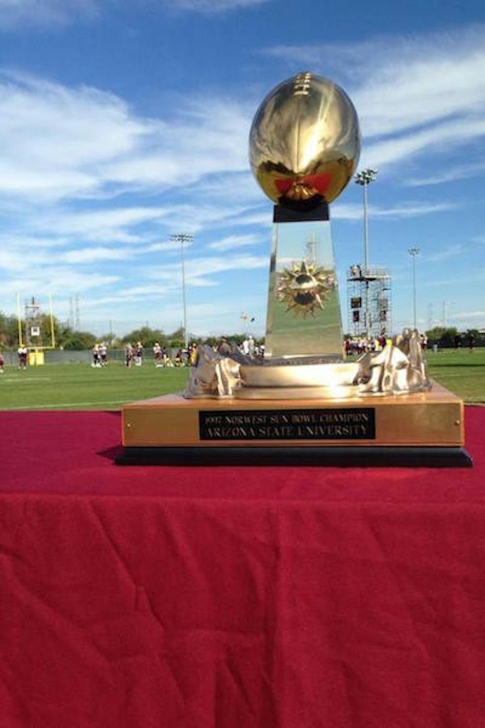 The 1997 Sun Bowl Trophy is on display at Kajikawa Practice Field in Tempe on Dec. 12. ASU will play Duke for the 2014 Sun Bowl on Dec. 27. (Photo by: Logan Newman).