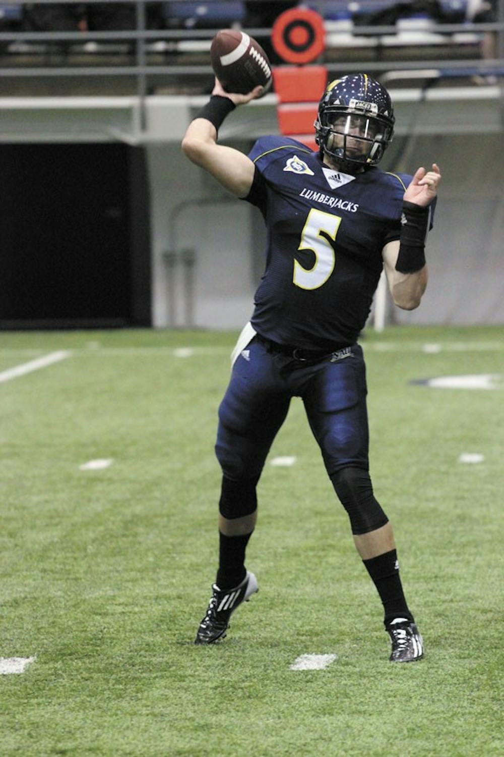 Junior quarterback Cary Grossart throws a pass during the game against Eastern Washington.