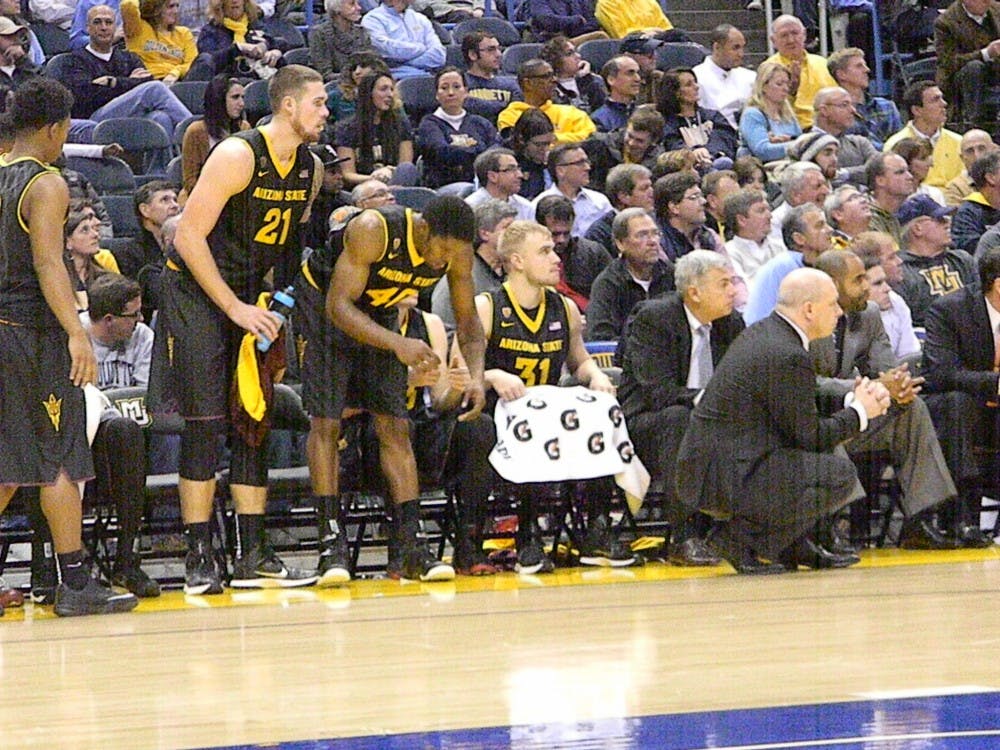 Coach Herb Sendek's Sun Devils fell to Marquette 78-71 on Dec. 16, 2014 at the Bradley Center in Milwaukee. (Photo by Stefan Modrich)