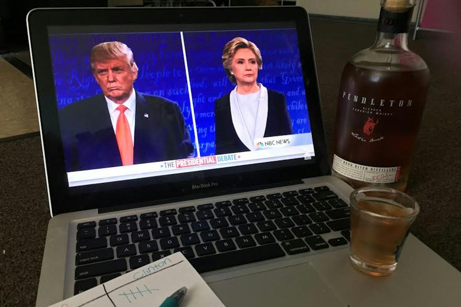 Photo illustrates&nbsp;Candidates Donald Trump and Hilary Clinton at the second presidential debate with a score card of how many "buzzwords" they have said.
