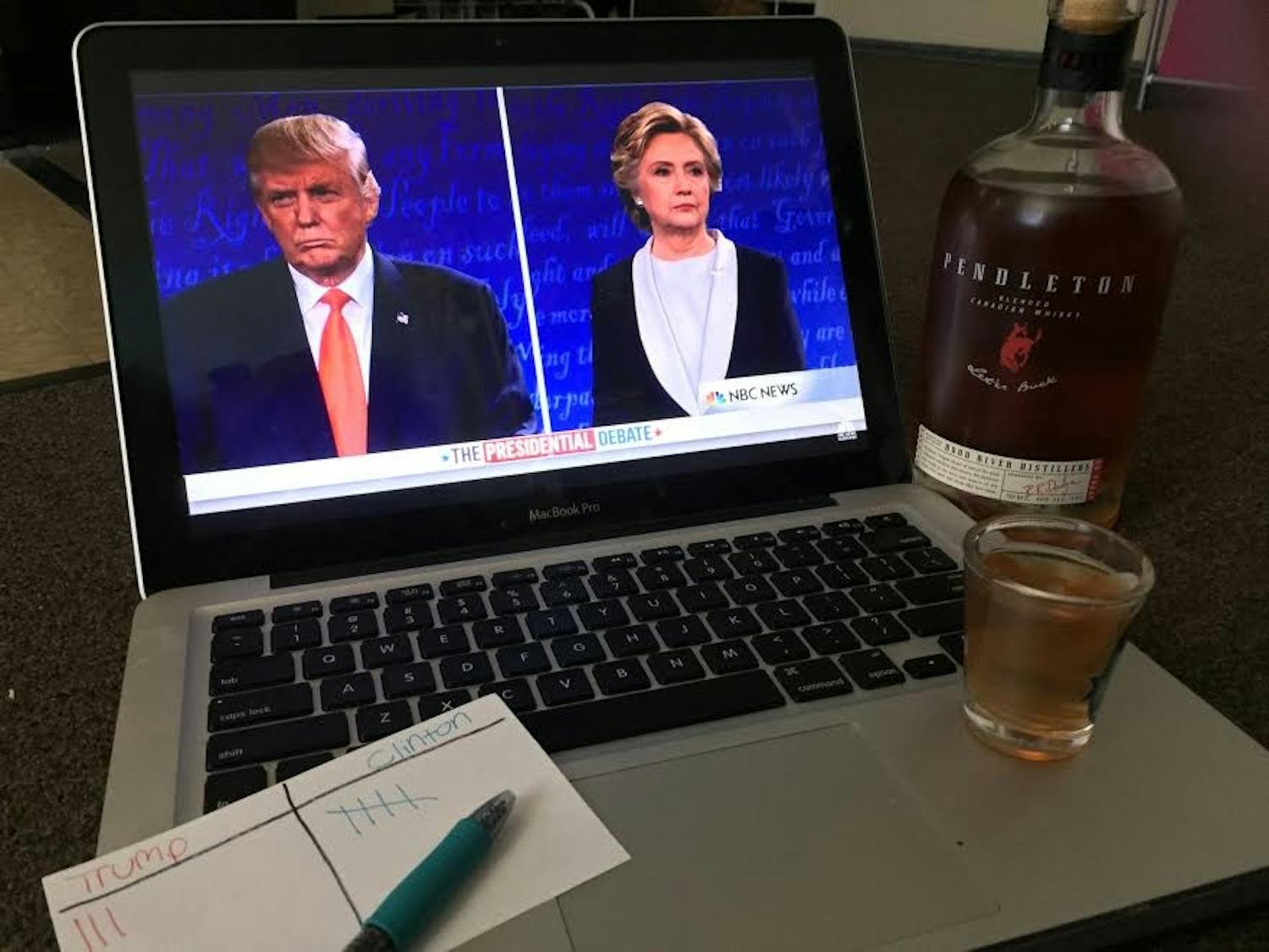 Photo illustrates&nbsp;Candidates Donald Trump and Hilary Clinton at the second presidential debate with a score card of how many "buzzwords" they have said.