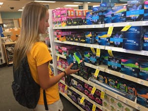 Jess Powers shops for tampons in the&nbsp;CVS Pharmacy on Jefferson Street and First Avenue in Phoenix on Sept. 29, 2016.