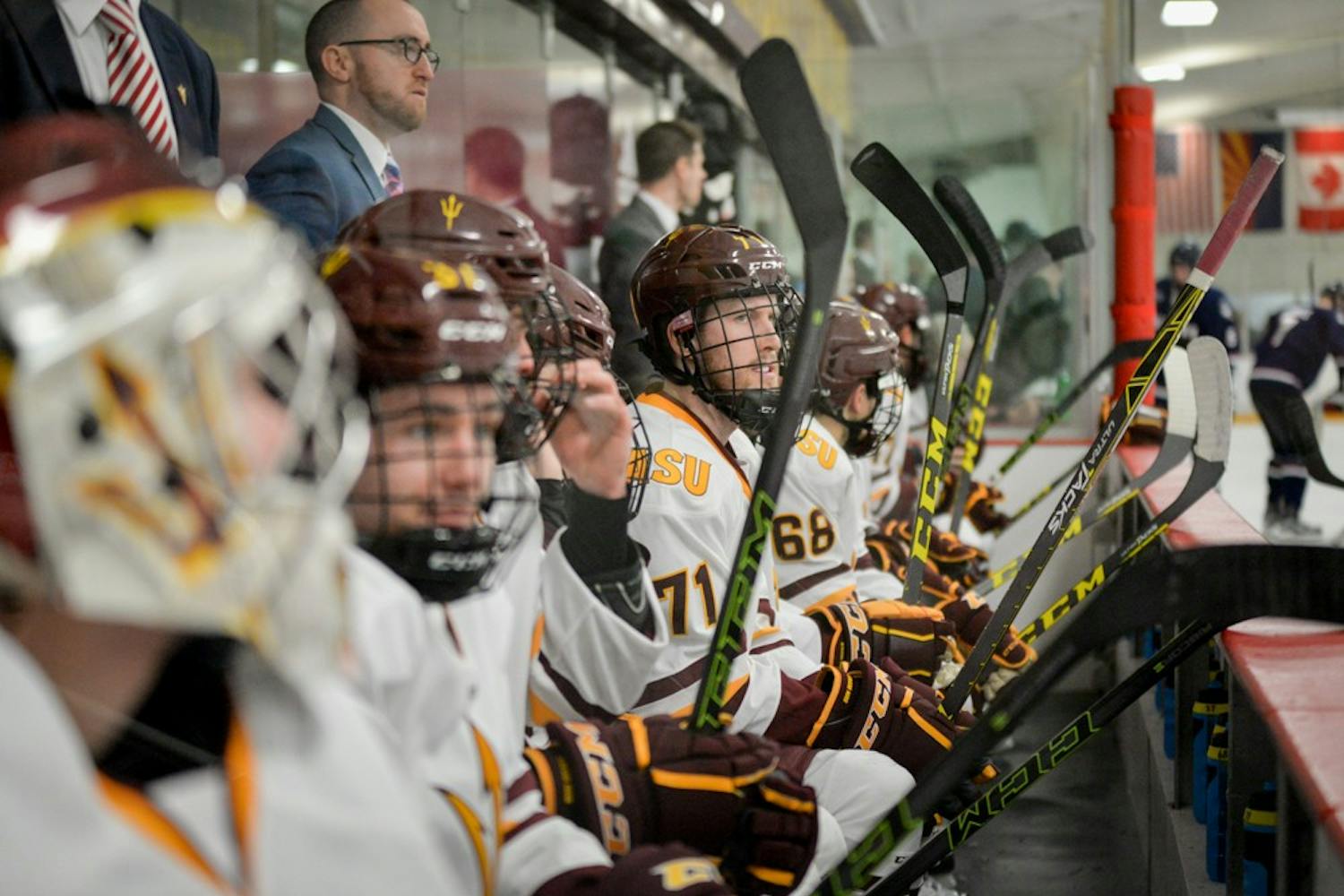 ASU's Hockey team looks on from the bench as the second period progresses on Tuesday, January 5, 2016 at the Oceanside Ice Arena in Tempe, AZ.