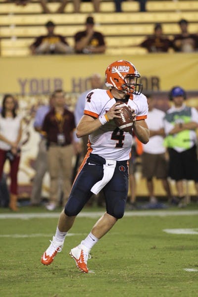 Illinois sophomore quarterback Reilly O’Toole scans the field Saturday during the Illini’s 45-14 loss to ASU. (Photo by Sam Rosenbaum)
