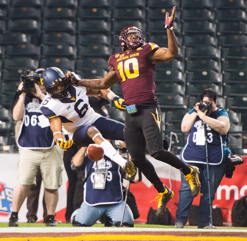 Senior defensive back Kweishi Brown (10) breaks up a pass against West Virginia during the Motel 6 Cactus Bowl on Saturday, Jan. 2, 2016, at Chase Field in Phoenix.