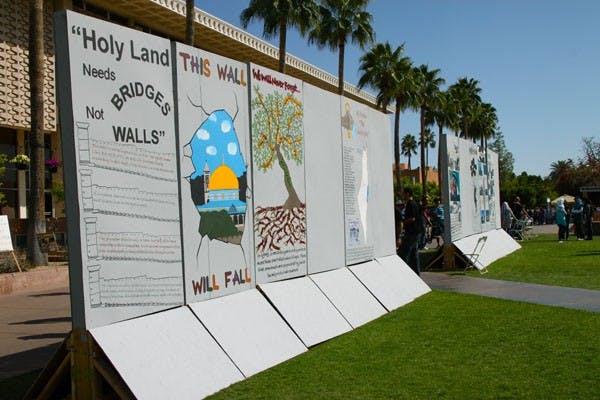 Students for Justice in Palestine built a mock barrier similar to the
one placed by a pro-Israel group for the Apartheid Week in March 2011. (Photo by Rosie Gochnour)