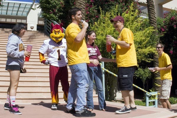 GO SUN DEVILS: Sparky made an appearance at the West campus on Thursday to get students pumped up for this weekend's sports events. (Photo by Annie Wechter)