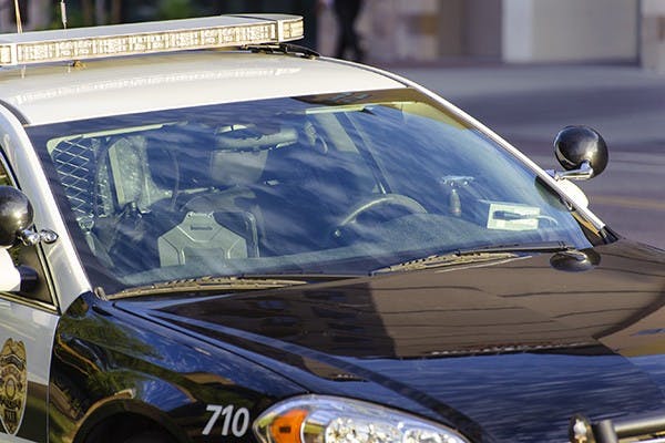 A police car is seen outside the Tempe Police Department headquarters in Tempe, Oct. 16, 2014. (Photo by Ben Moffat)
