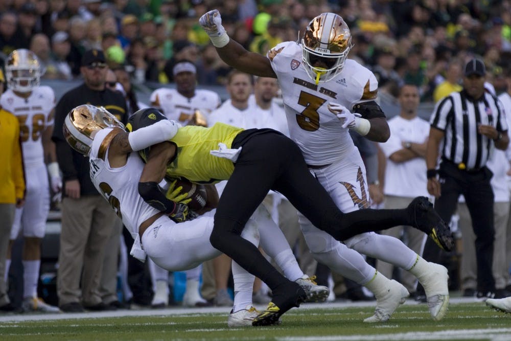 ASU junior cornerback Maurice Chandler (16) makes a tackle in the first half of a game versus the Oregon Ducks in Autzen Stadium in Eugene, Oregon on Saturday, Oct. 29, 2016. 