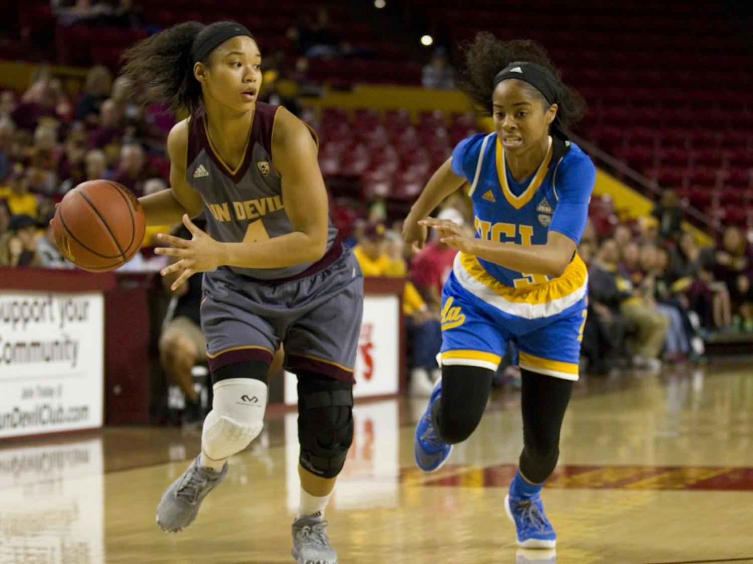 ASU freshman guard Kiara Russell (4) looks to drive to the basket during a women's basketball game against the no. 15 ranked UCLA Bruins in Wells Fargo Arena in Tempe, Arizona on Sunday, Feb. 26, 2017. ASU lost 55-52.  (Josh Orcutt/State Press)