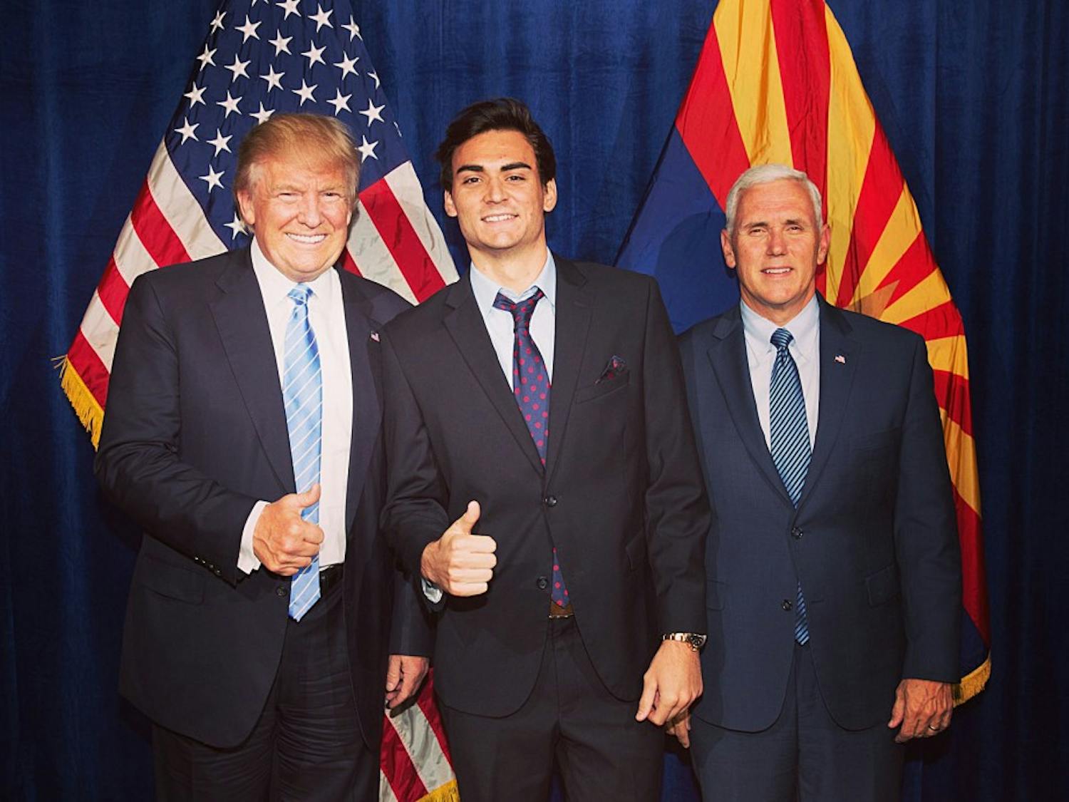 ASU student Danny Cox, who temporarily&nbsp;withdrew from the University to assist in Donald Trump's campaign for president, poses for a photo with Trump and his running&nbsp;mate Gov.&nbsp;Mike Pence.&nbsp;