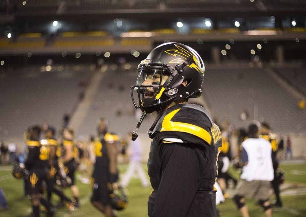 ASU Sun Devils quarterback Manny Wilkins (5) walks off the field after a football game against the Utah Utes in Sun Devil Stadium on Thursday, Nov. 10, 2016. 