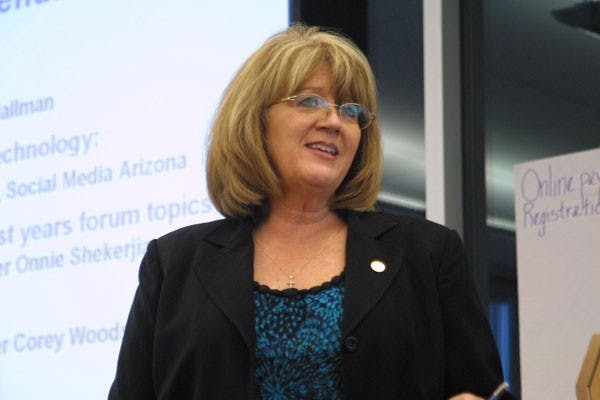 FUTURE OF TECHNOLOGY: Councilwoman Onnie Shekerjian discusses the current and future technological enhancements that will be available in the city of Tempe during the Technology Community Forum on Wednesday night at the Tempe Transportation Center. (Photo by Serwa Adu-Tutu)