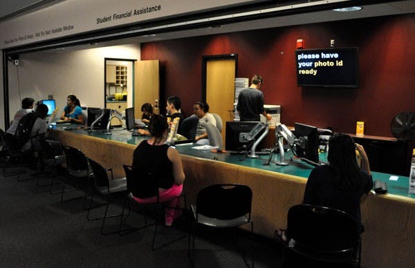 ASU students visit the Financial Aid Office at the Tempe campus Monday evening. According to a recent report by Project on Student Debt at The Institute for College Access & Success, students that graduate from an Arizona college have the fifth lowest amount of debt in the country. (Photo by Danielle Gregory)