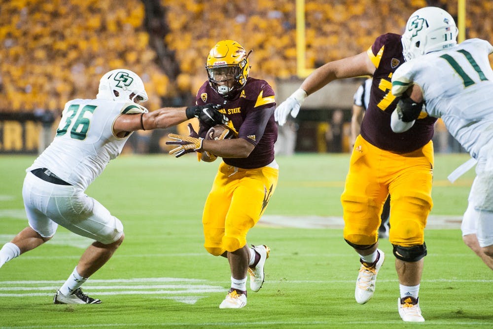 Sophomore running back Demario Richard rushes for a touchdown against Cal Poly on Saturday, Sept. 12, 2015, at Sun Devil Stadium in Tempe.