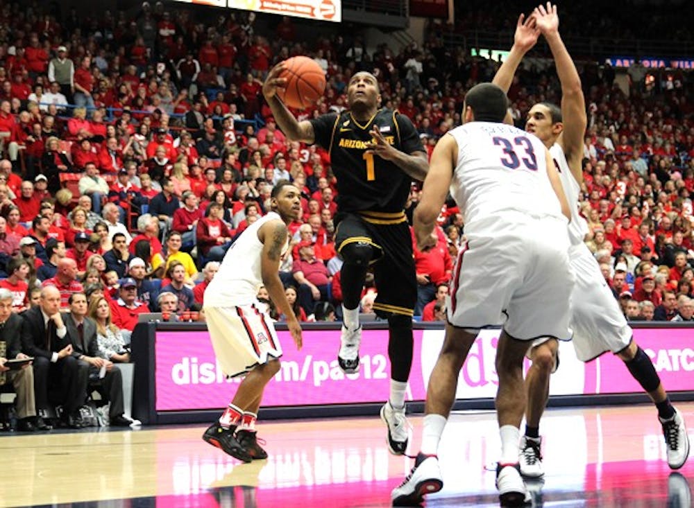 Redshirt junior guard Jahii Carson pushes off his left foot to put up a layup against UA on March 9. Carson loved the support the team received from ASU fans in Las Vegas for the Pac-12 tournament. (Photo by Dominic Valente)
