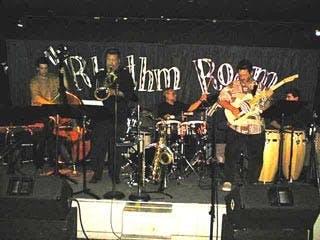 Dom performing with Sonido Global. Photo courtesy of Dom Moio.