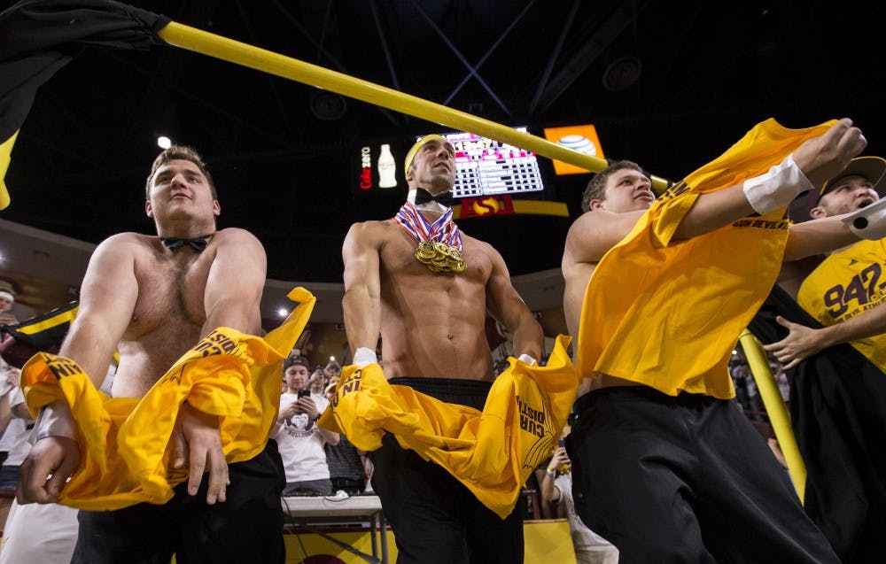 The most decorated Olympian of all time, Micheal Phelps, makes an appearance in the Curtain of Distraction during a game against the Oregon State Beavers at Wells Fargo Arena in Tempe, Arizona, on Thursday, Jan. 28, 2015. The Sun Devils took the win over the Beavers, 86-68.