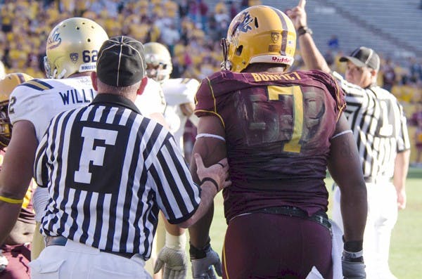 GROWING UP: After a play against UCLA last season on Nov. 26, 2010, ASU junior linebacker Vontaze Burfict returns to the line of scrimmage. Listed on many awards watch lists, Burfict leads a promising ASU defense coming into the new season. (Photo by Aaron Lavinsky)