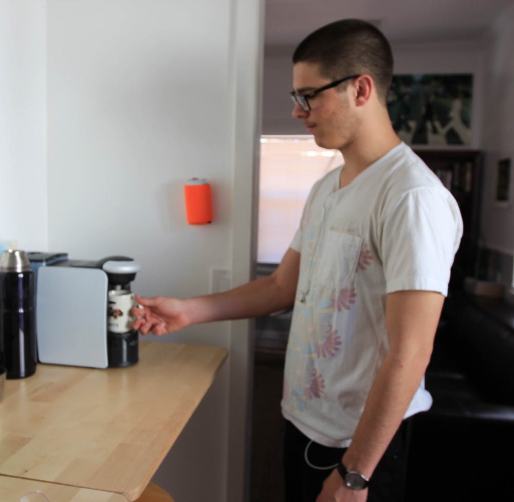 Need Someone to hold your drink whilst you make another drink? Look no further, the Koozies stick to walls! 
Photo by Dominic Valente
