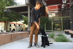 Patrick McCarthy works with service dog Gonzo.