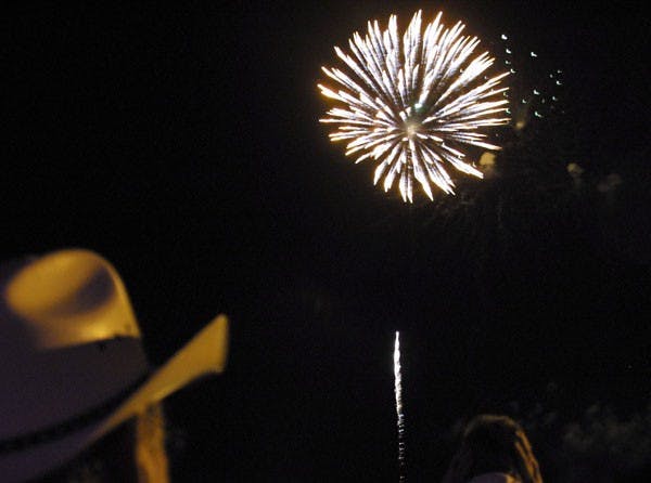SERWAA ADU-TUTU | THE STATE PRESSLIGHT SHOW: An explosion of fireworks lights up the night sky during the Independence Day celebration at Tempe Beach Park Sunday night.