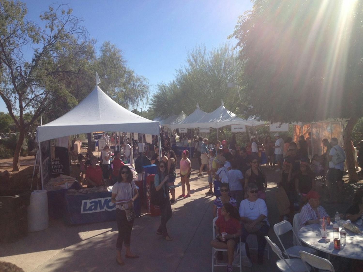 Festival-goers enjoy food, crafts, and a lot of Tempe history.