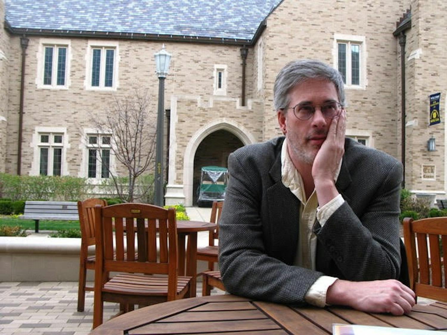 Prof. William Moore visits a scholar at Notre Dame University.