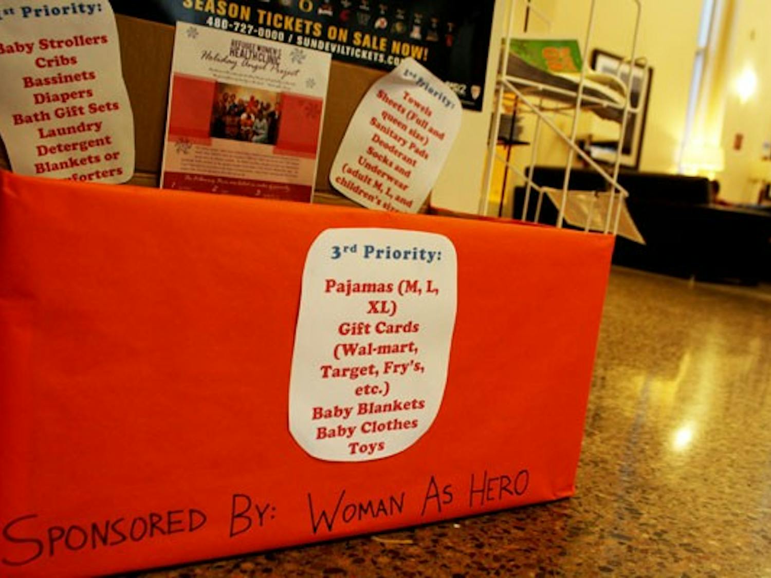 Woman As Hero is one of many student organizations that is collecting donations this holiday season. The group has set up stations around campus where the ASU community can donate clothes and apparel that will go to women refugees. (Photo by Jessie Wardarski)